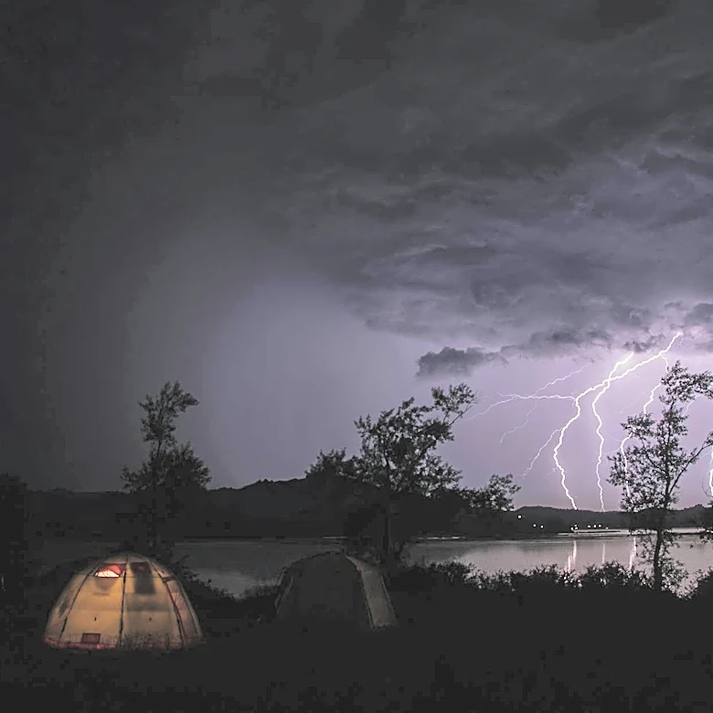 Weather Considerations for Camping Trips: Unpredictable Conditions in Wilderness