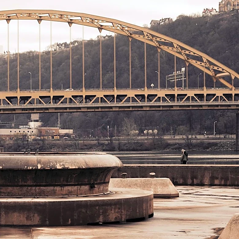 Sunny Weather Draws Visitors to Frick Park in Pittsburgh