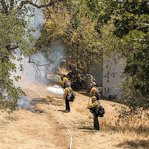 Colorado Firefighters Assess Wildfire Survivability of Homes During Training