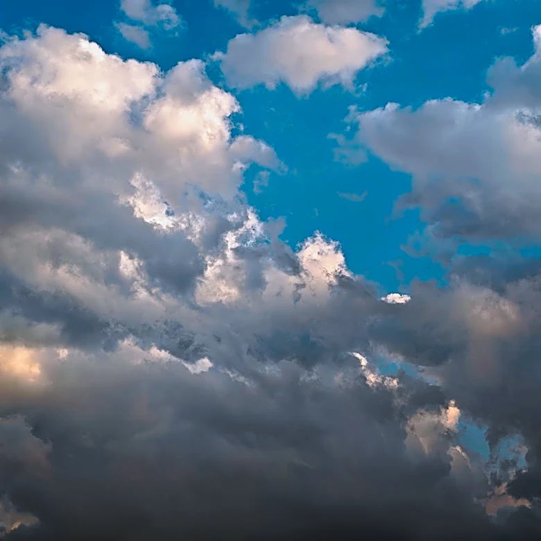 Morning Sprinkles Followed by Partly Cloudy Skies and Warmer Week Ahead