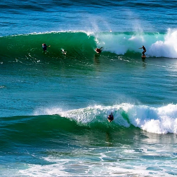 California Lifeguards Conduct Thousands of Rescues Amid High Surf and Heat Wave