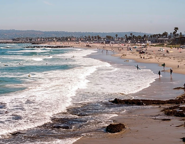 San Diego Faces Late-Summer Heat Wave and High Surf