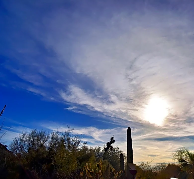 Partly Cloudy Skies in Phoenix with 30% Rain Chance