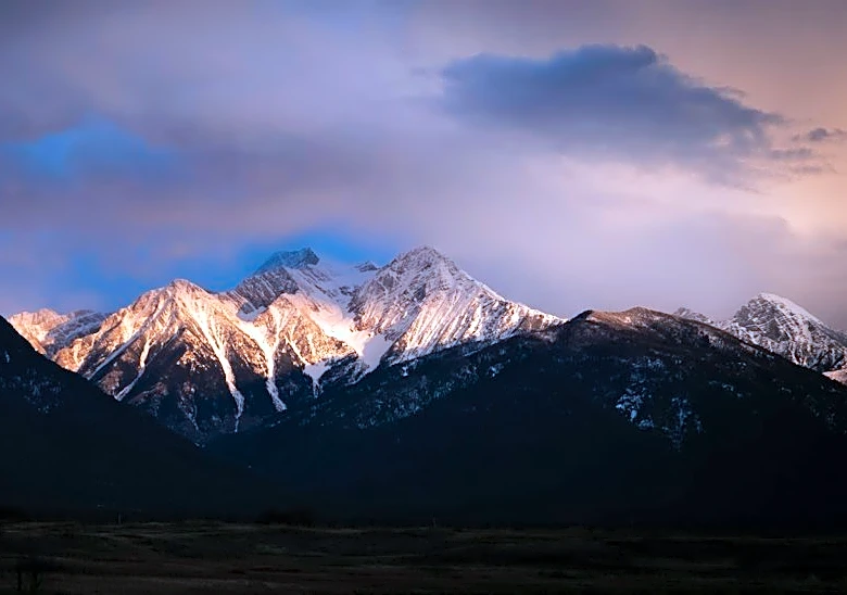 Mountain Snow and Valley Rain Persist in Montana