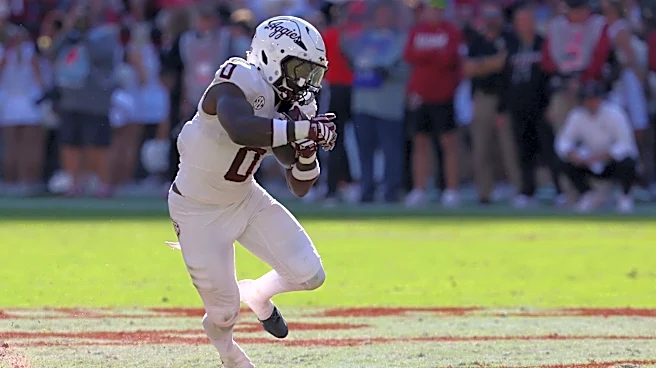 Which Texas A&M true freshmen have stood out through eight games?