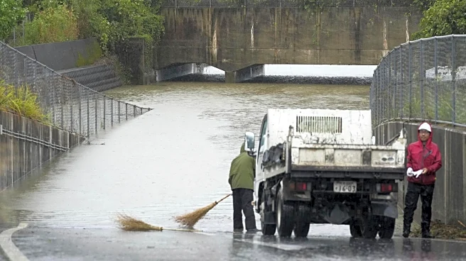 Heavy rains in southern Japan cause flooding and mudslides, and leave several people missing
