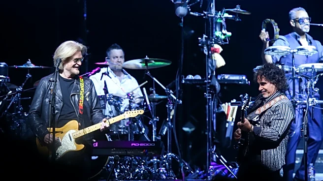 Business spat between Daryl Hall and John Oates has been resolved in arbitration, attorneys say