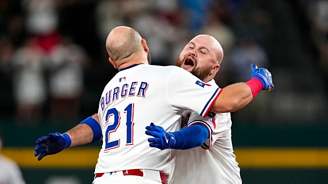 Burger hits RBI single in 10th as Rangers end 4-game skid with win over Diamondbacks