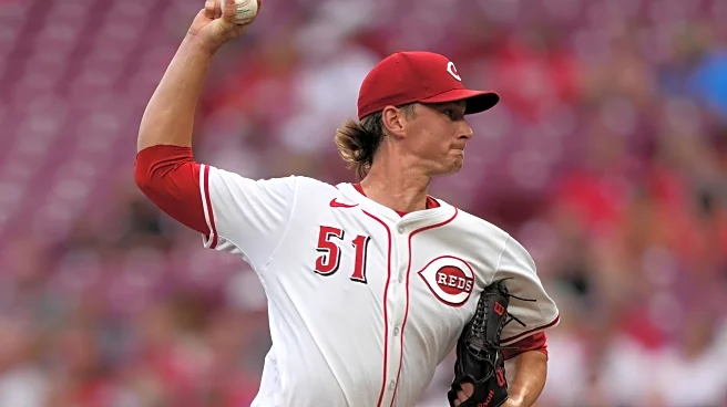 Singer works 6 shutout innings, Steer drives in 3 runs as the Reds end Phillies' 4-game win streak