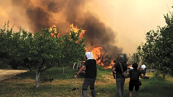 At least 3 dead and thousands displaced as wildfires rage across southern Europe