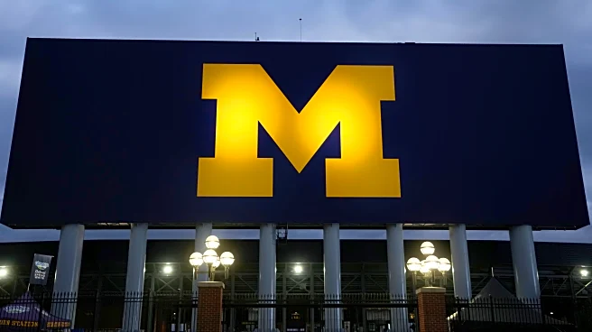 NCAA fines Michigan millions, suspends Moore 3 games over sign-stealing scandal