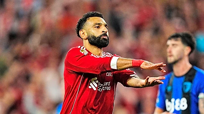 Late goals, Jota tributes and racism claim as Liverpool wins Premier League opener