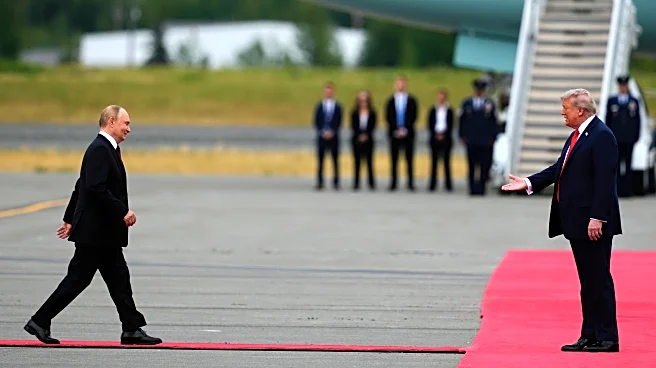 Trump and Putin share handshake in Alaska, a warm greeting belying the bloodshed in Ukraine