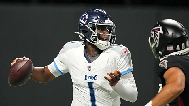 Brooks scores on interception return as Ward has mixed results in Titans' 23-20 win over Falcons