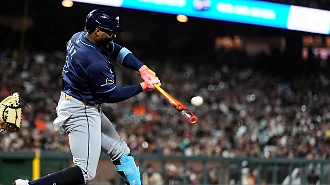 Yandy Diaz singles in the deciding run in the 9th in the Rays' 7-6 victory over the Giants