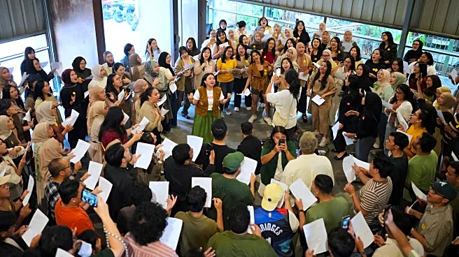 Photos show games, dancing and singing bringing people together in Indonesia
