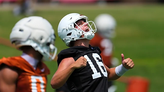 Texas QB Manning says NFL plans not taking shape yet despite grandpa's prediction of 2026 in Austin