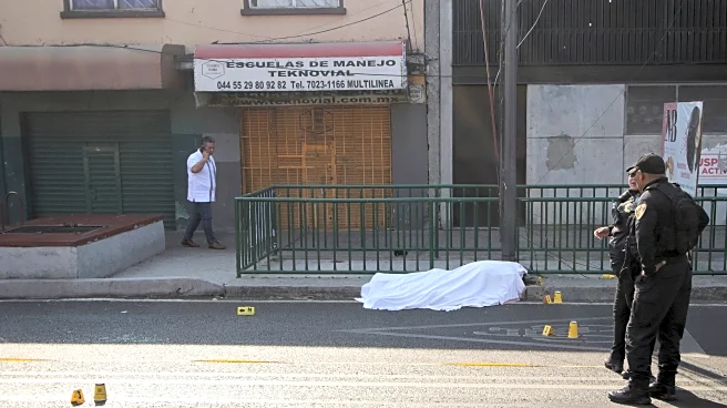 Mexico City mayor says police have arrested 13 in connection with killings of her staffers