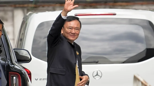 Former Thai Prime Minister Thaksin Shinawatra says he has been acquitted of royal defamation