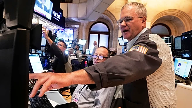 Stocks and bonds are steady as Wall Street waits for a speech on interest rates
