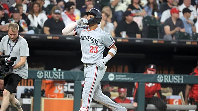 Lewis hits grand slam as Twins beat White Sox 9-7 to snap 3-game skid