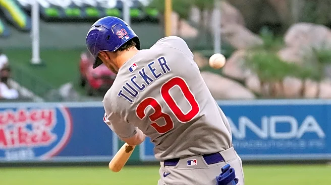 Tucker hits 2 homers and drives in 5 as Cubs blow out Angels 12-1