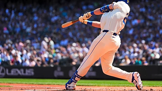 Cal Raleigh hits his 48th, 49th homers to set MLB season mark for catchers, passing Salvador Perez
