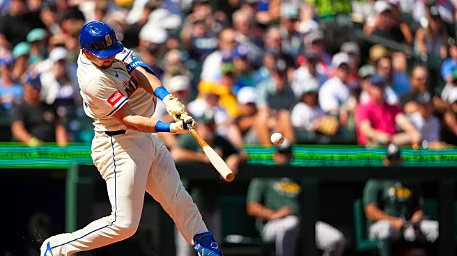 Cal Raleigh sets single-season home run record for catchers as Mariners top Athletics 11-4