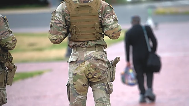 Some National Guard units in Washington are now carrying firearms in escalation of Trump deployment