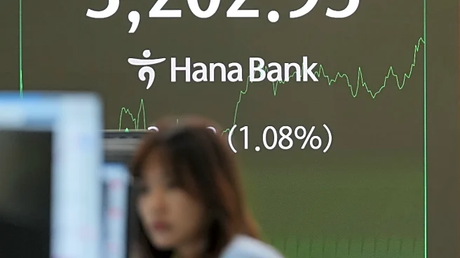 World shares are mixed after Fed chair Powell hints at rate cuts