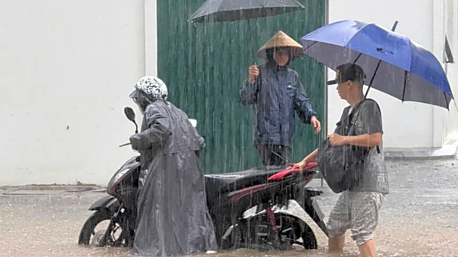 Heavy rain falls in parts of Southeast Asia after tropical storm blows into Vietnam