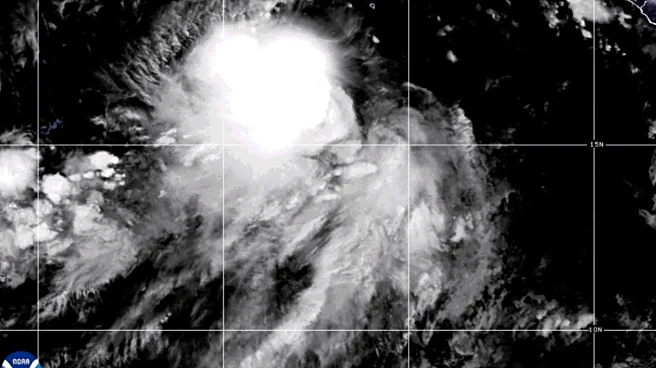 Tropical storms Juliette and Fernand churn over open waters in different oceans