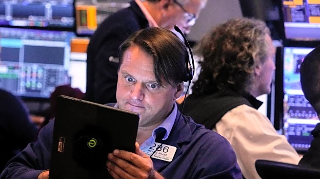 A late push sends Wall Street near its records
