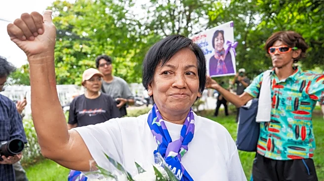A royal pardon frees a Thai woman serving a 43-year prison term for defaming the monarchy