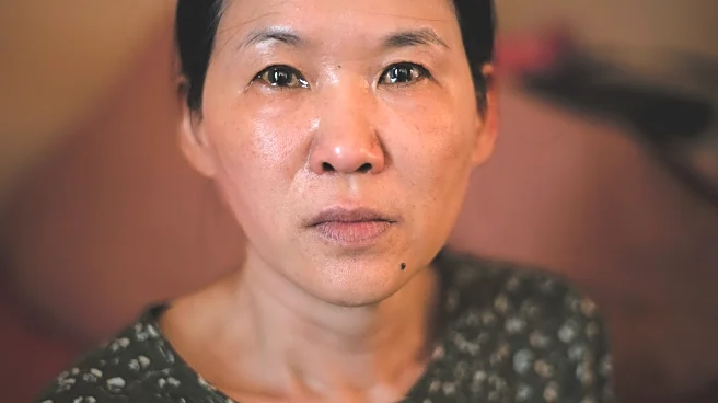 Woman seeks compensation from South Korea over her forced adoption to France in 1984
