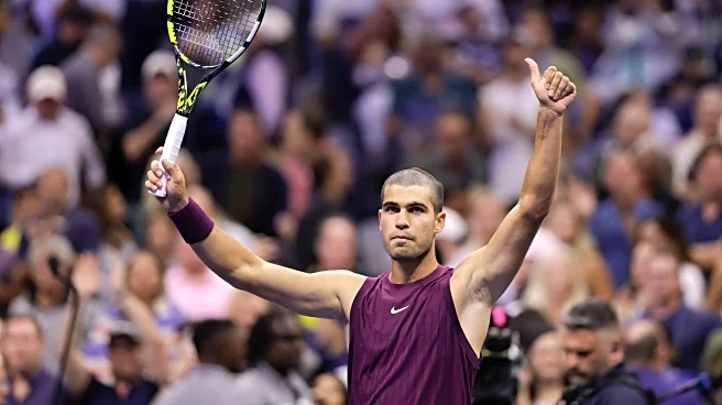 Still sporting his accidental buzz cut, Carlos Alcaraz wins easily at the US Open