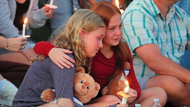 Minneapolis Catholic schoolchildren listened to a prayer, then ducked for cover from gunfire