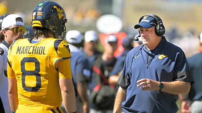 Marchiol and White shine, West Virginia beats Robert Morris 45-3 in Rich Rodriguez's coaching return