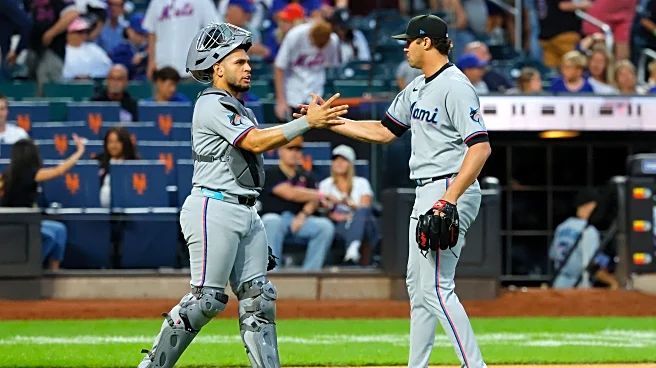 Norby helps Marlins avoid collapse in 11-8 win over Mets