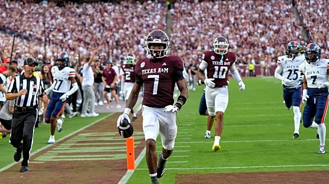 Reed's career-high 4 TD passes and Conception's debut lead Texas A&M to 42-24 win over UTSA