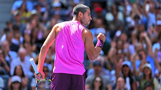 Carlos Alcaraz uses some behind-the-back magic to win a US Open point against Rinderknech