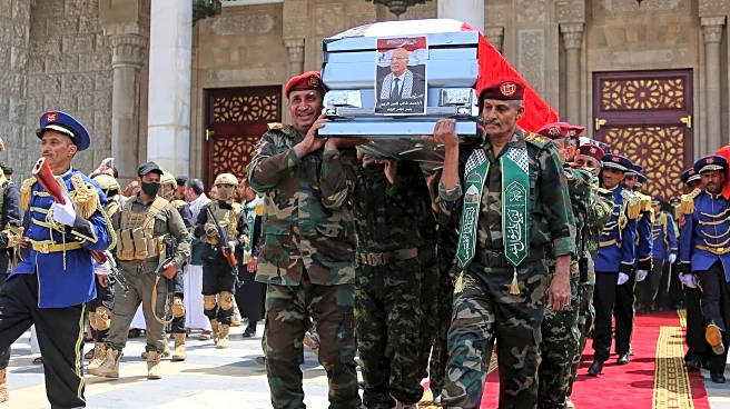 Yemenis mourn killed Houthi prime minister as rebel group targets ship in Red Sea