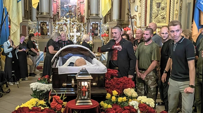 Hundreds mourn pro-Western Ukrainian politician who was gunned down in the street