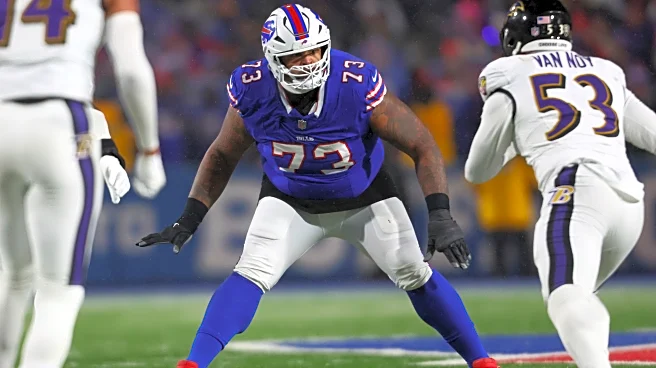 Bills restructure left tackle Dion Dawkins' contract to get under NFL's salary cap, AP source says