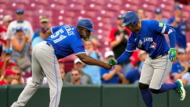 Blue Jays tie season-high with five homers in 13-9 win over Reds