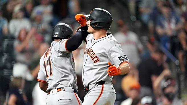 Chapman homers twice after appealing suspension to help the Giants beat the Rockies