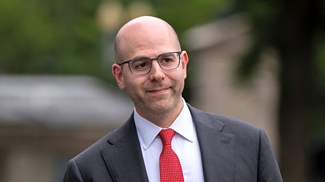 Trump's Fed nominee says he'd keep his White House job even if confirmed by the Senate
