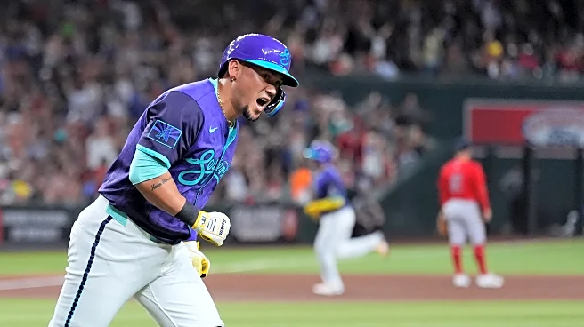 Carroll hits 30th home run and Diamondbacks pull away late to beat Red Sox 10-5