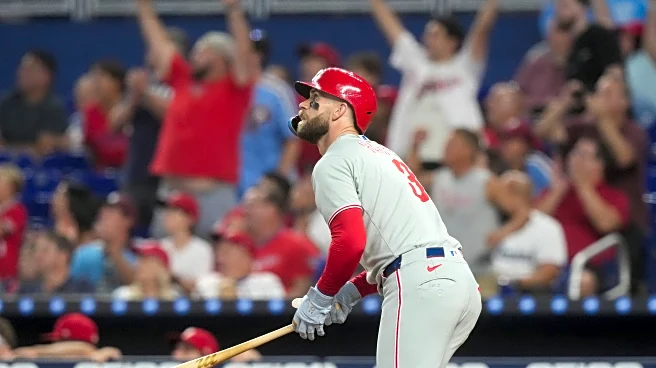Harper homers and NL East-leading Phillies beat Marlins 4-2
