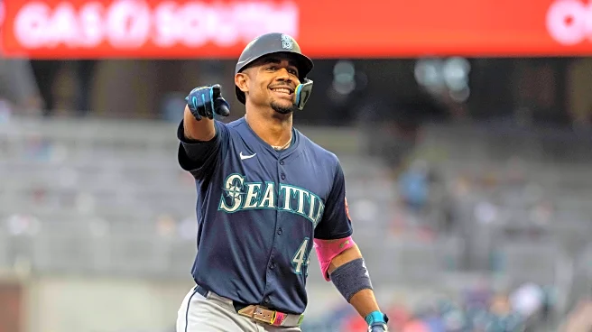 Rodríguez hits 2 homers, Raleigh gets his 52nd, and Mariners down Braves 10-2